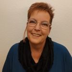 Meisterin mit Nadel und Faden